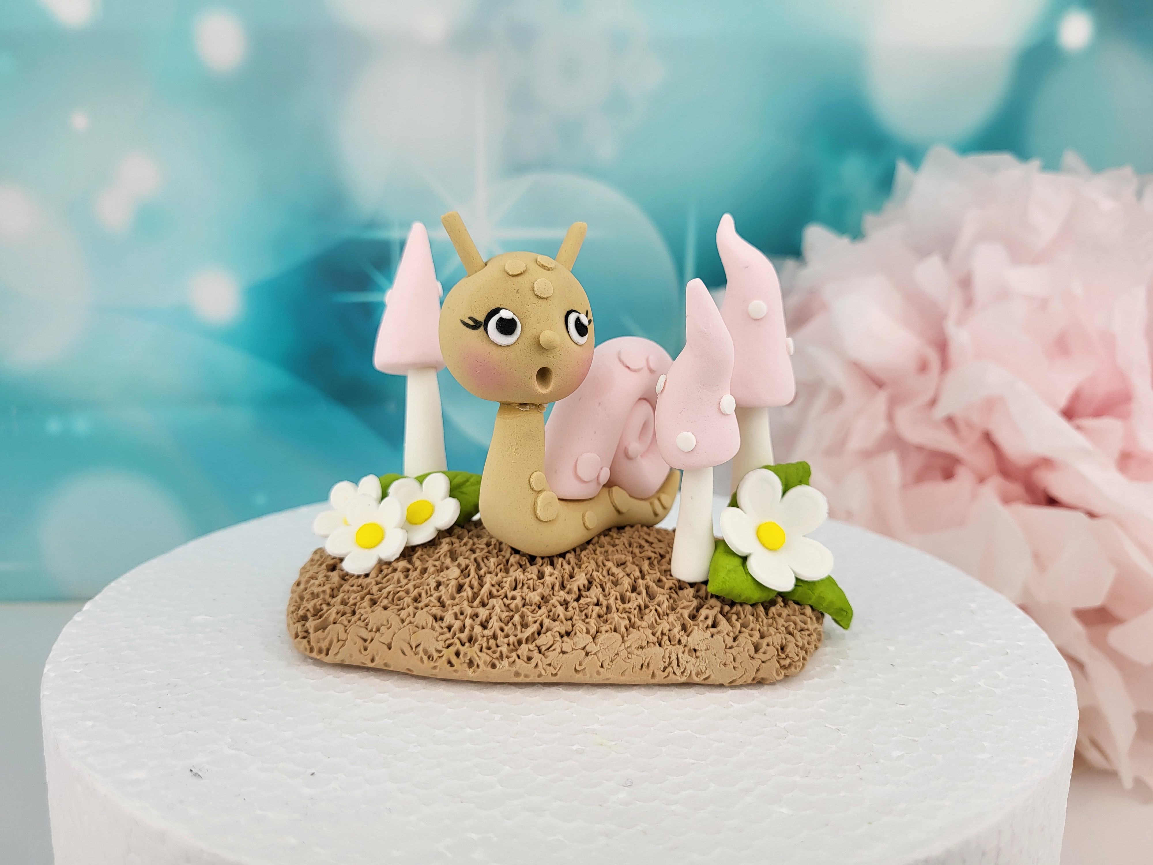 Tortenfigur „Schnecke mit Waldpilzen“