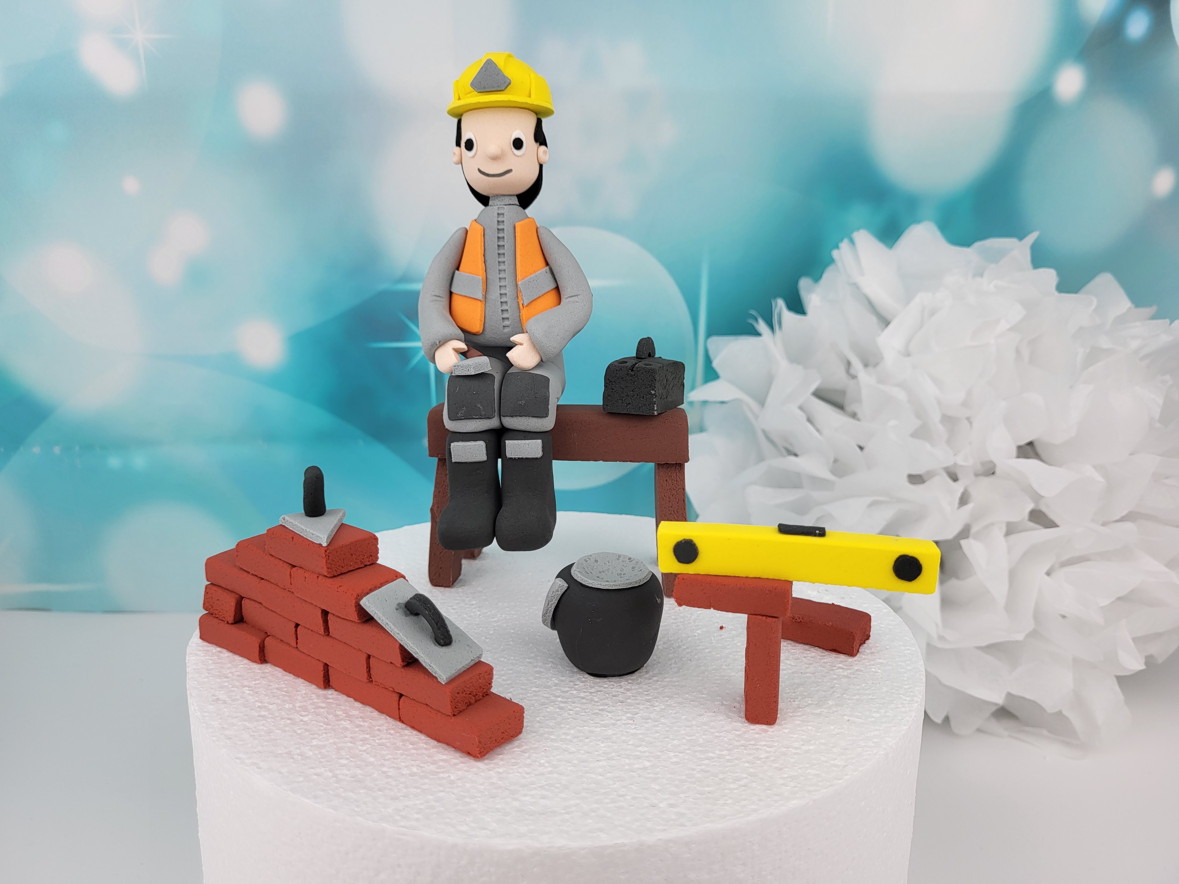 Tortenfiguren Bauarbeiter mit Mauer