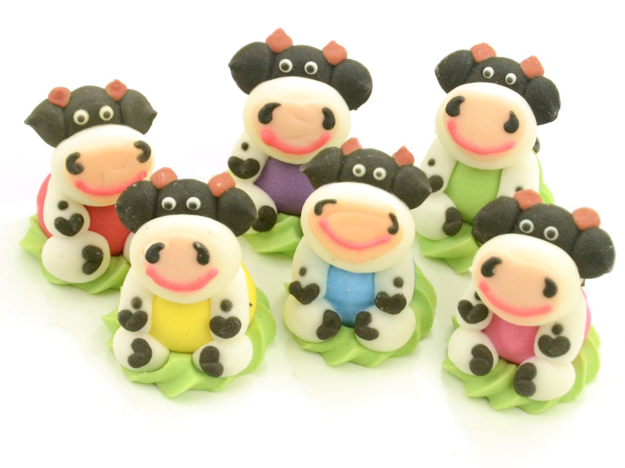 Zuckerfiguren Kühe sitzend 6 Stück